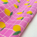 Poppy Design Beschichtete Baumwolle Stoff kariert Zitronen rosa
