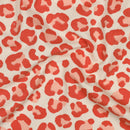 Poppy angerauter Soft Sweat Stoff Leo Muster orange