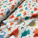 Jersey Stoff Dinosaurier beige