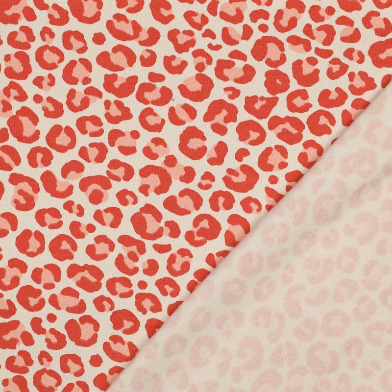 Poppy angerauter Soft Sweat Stoff Leo Muster orange