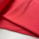 Rippjersey Stoff korall uni