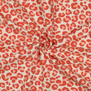 Poppy angerauter Soft Sweat Stoff Leo Muster orange