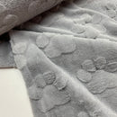 Fleece Stoff Pfoten grau
