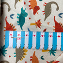 Jersey Stoff Dinosaurier beige