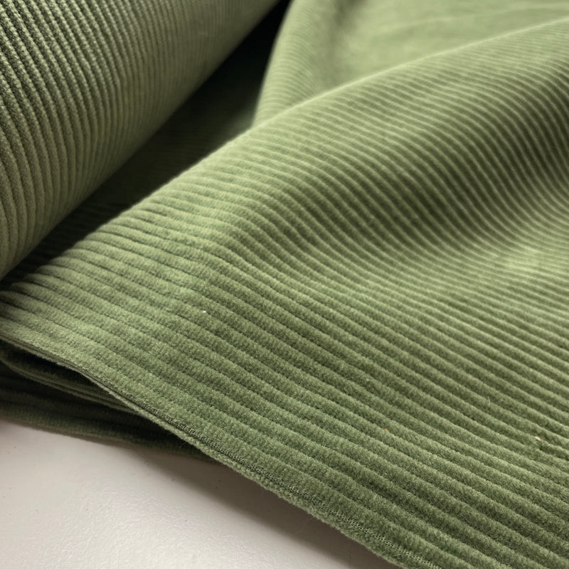 Kord Stoff mit Elastan grün